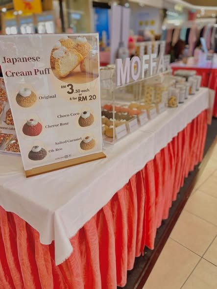 Moffa booth table with Japanese Cream Puff menu stand