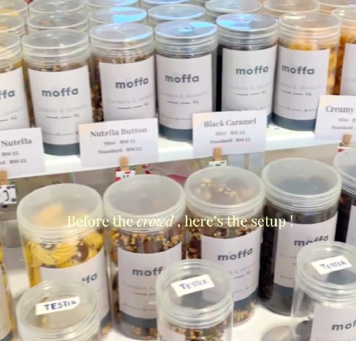 Moffa cookie jars neatly lined up at the pop-up booth